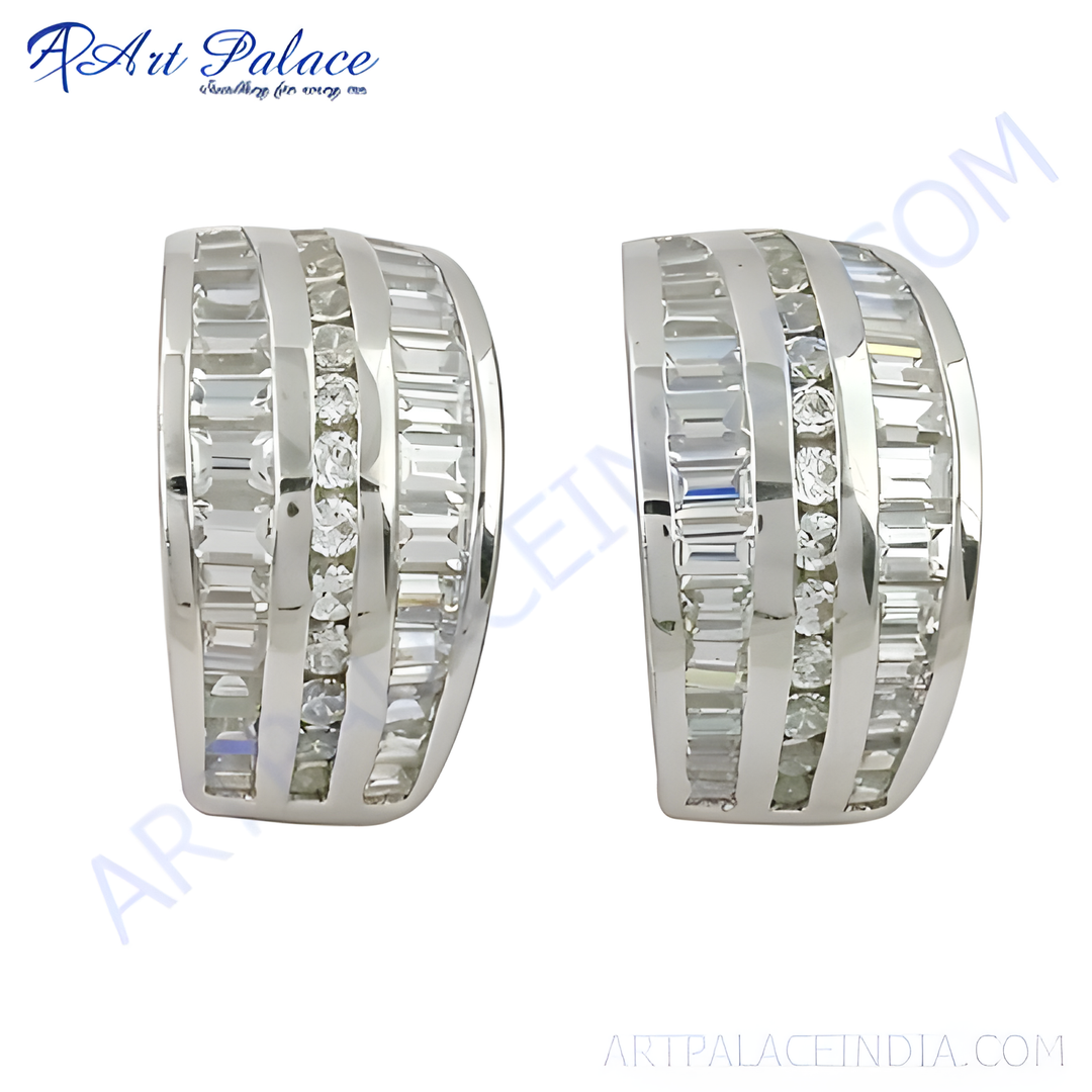 Silver hoop earrings with baguette-cut cubic zirconia stones. Elegant and sparkling design for women.