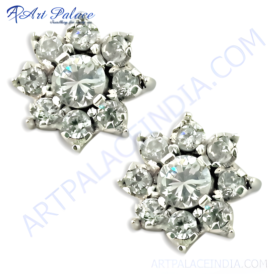 Floral stud earrings featuring round cubic zirconia stones set in a silver metal setting, perfect for women.