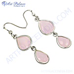 Load image into Gallery viewer, Sterling silver drop earrings featuring two pear-shaped pink gemstones.
