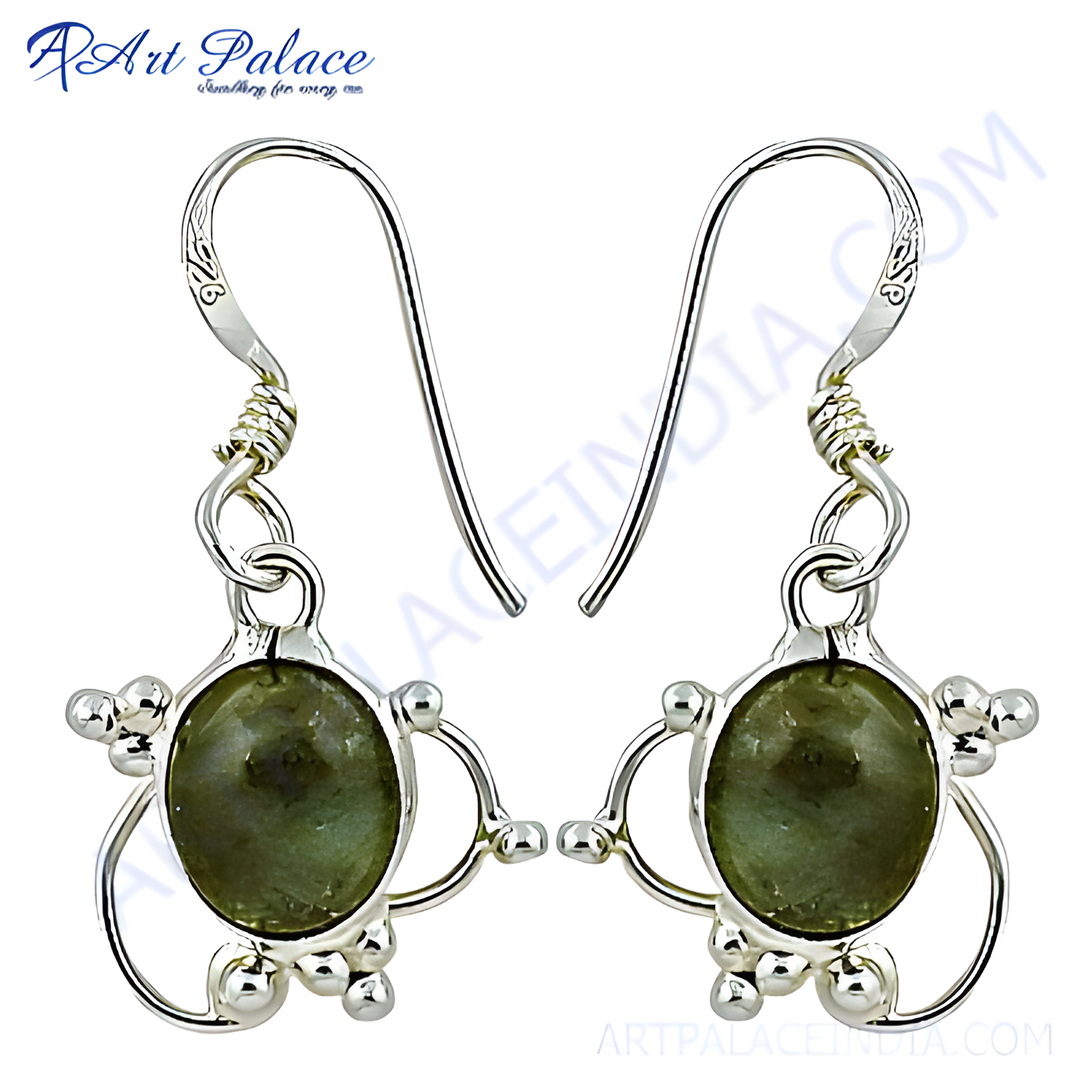 925 sterling silver dangle earrings with oval-shaped green gemstone details. Silver earrings for women.