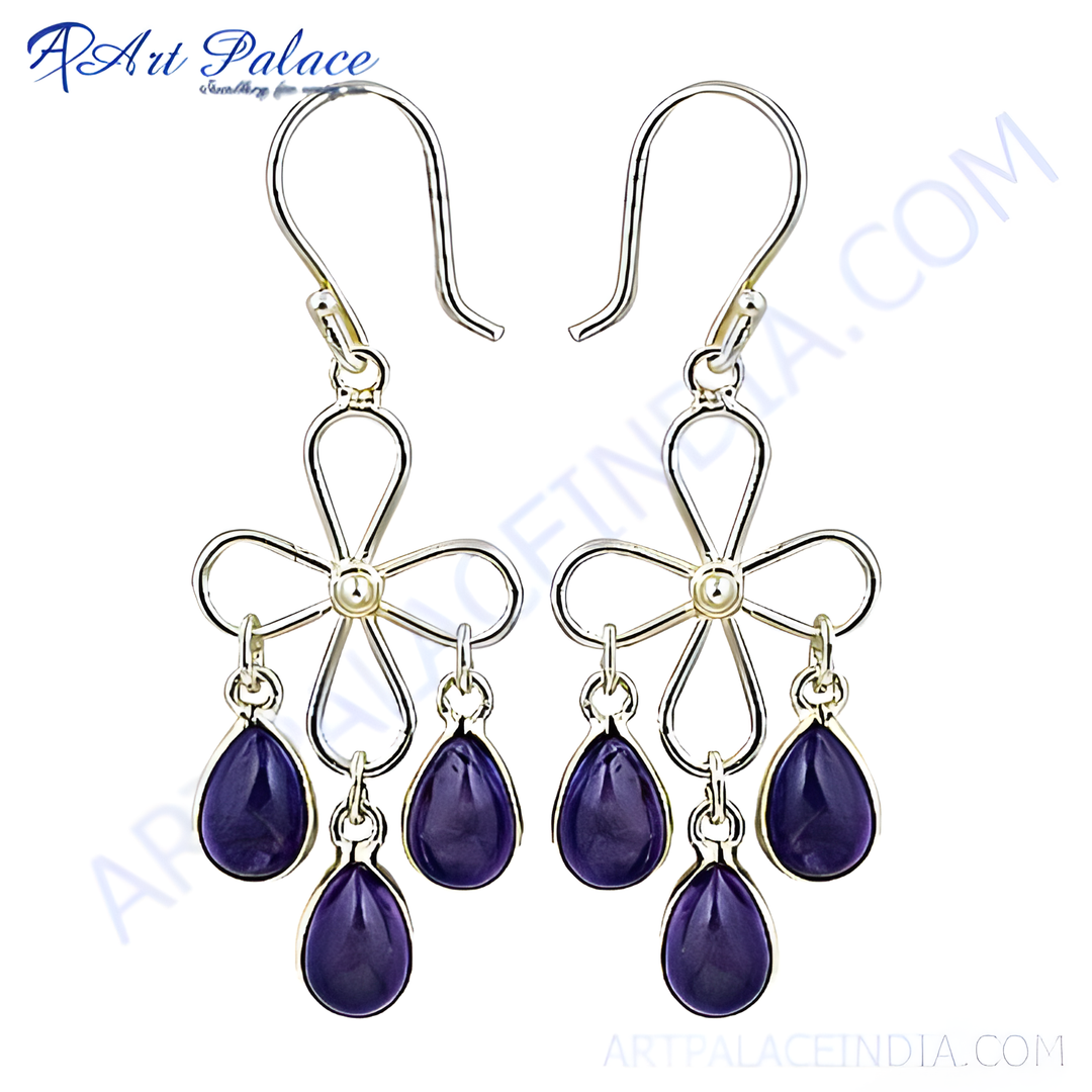Sterling silver dangle earrings with a flower design and purple amethyst gemstones.