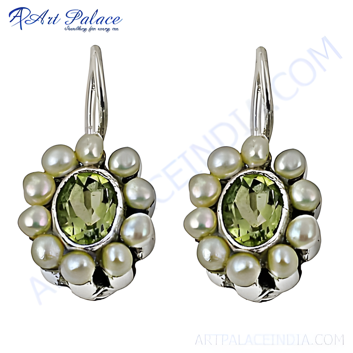 Sterling silver drop earrings with white pearls surrounding a green peridot gemstone center