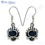 Load image into Gallery viewer, 925 sterling silver dangle earrings featuring oval-cut blue sapphire gemstones, perfect for women.
