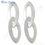 Load image into Gallery viewer, Silver drop earrings with a linked oval design, showcasing a polished finish for a modern look.
