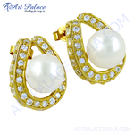 Load image into Gallery viewer, gold plating stud earrings with white pearl center and cubic zirconia pave detailing
