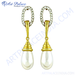 Load image into Gallery viewer, gold plating drop earrings with white pearl drops and a diamond-like accent on top.
