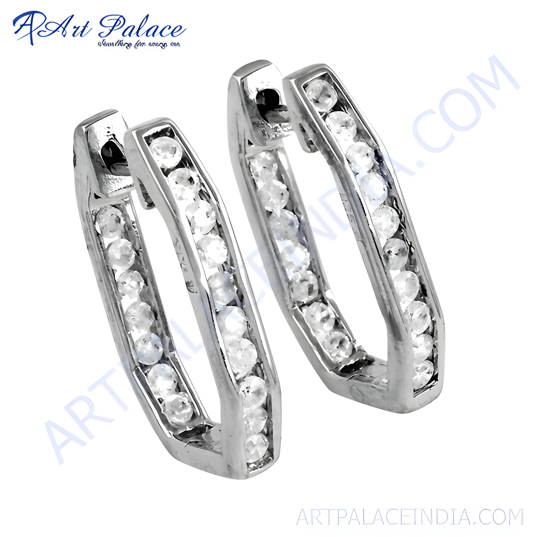 Silver hoop earrings with sparkling clear cubic zirconia stones. Elegant and perfect for everyday wear.
