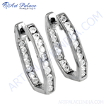 Load image into Gallery viewer, Silver hoop earrings with sparkling clear cubic zirconia stones. Elegant and perfect for everyday wear.
