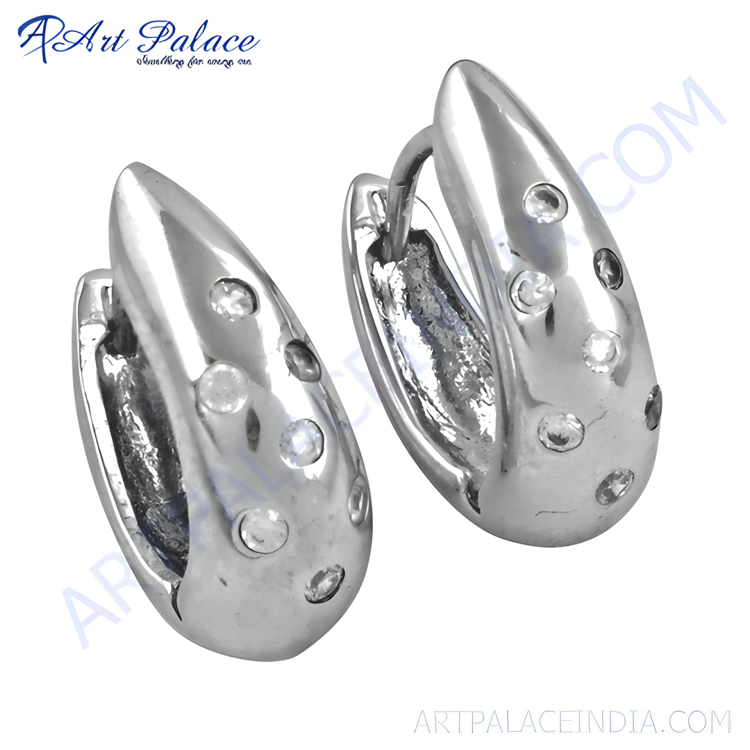 Sterling silver hoop earrings with clear cubic zirconia accents, a classic and elegant design.