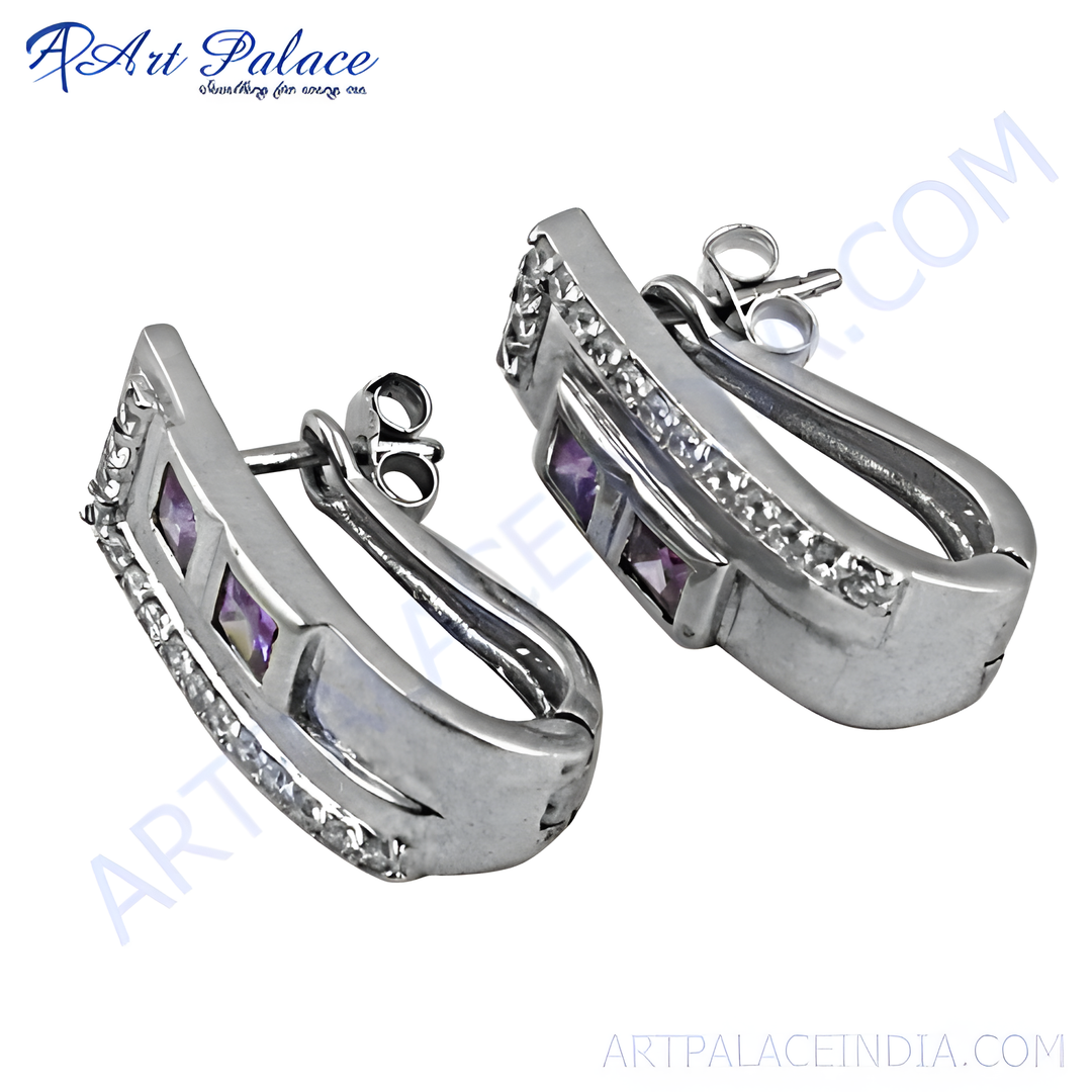 Silver stud earrings with amethyst stones. Elegant, delicate design perfect for women.