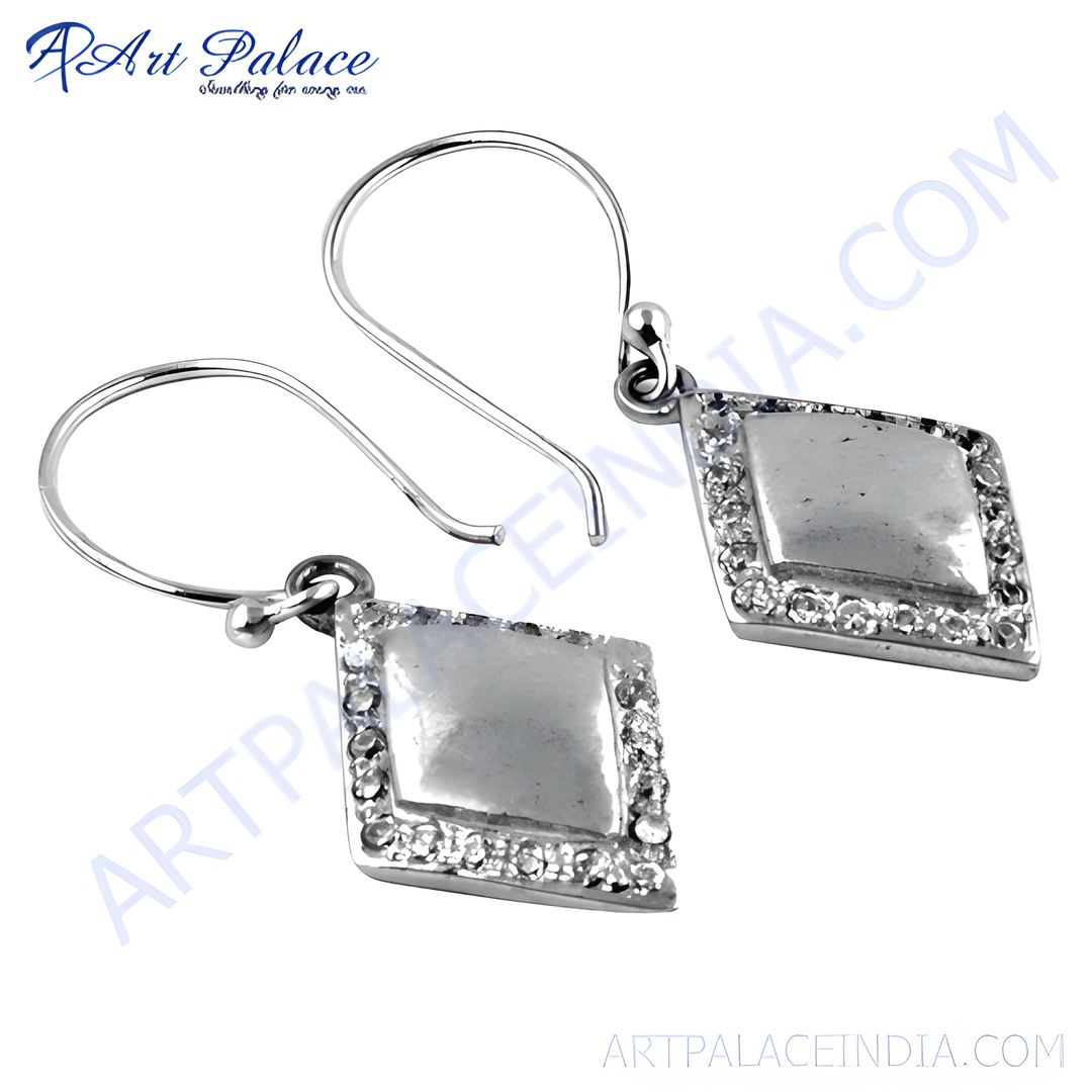 Silver rhombus dangle earrings with clear cubic zirconia stones. Fashion jewelry for women.
