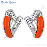 Load image into Gallery viewer, Silver stud earrings with orange enamel detailing, a stylish and colorful jewelry piece.
