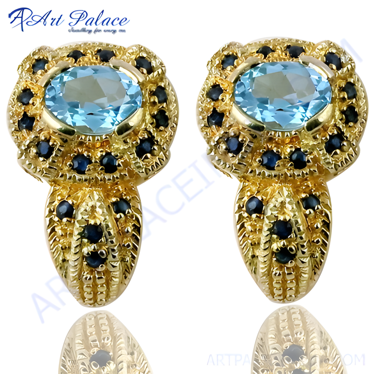 Gold plating stud earrings with a large oval blue topaz center stone and sapphire accents