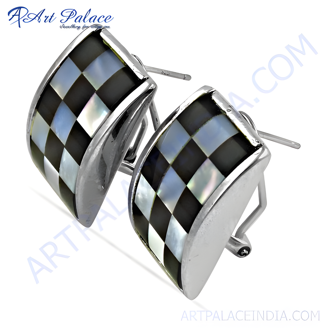 Silver stud earrings with a checkerboard design featuring black and white mother of pearl inlay