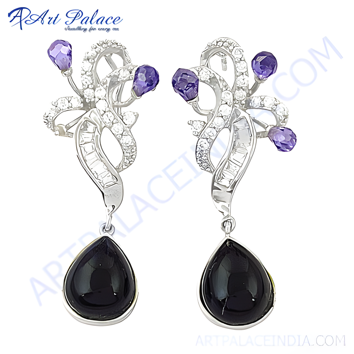Sterling silver dangle earrings with black teardrop onyx gemstones and purple accents on white background