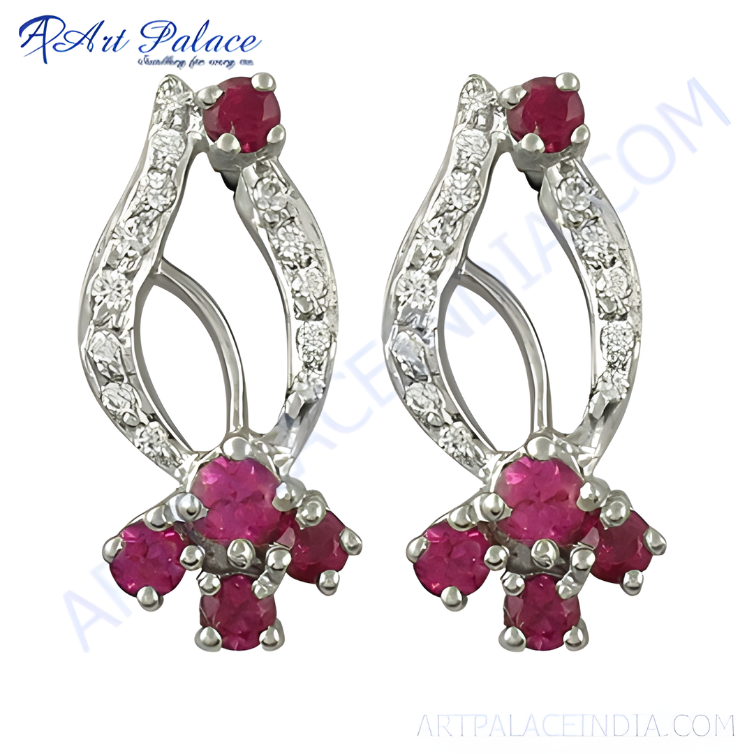 Elegant silver stud earrings featuring rubies and diamonds, designed for women.