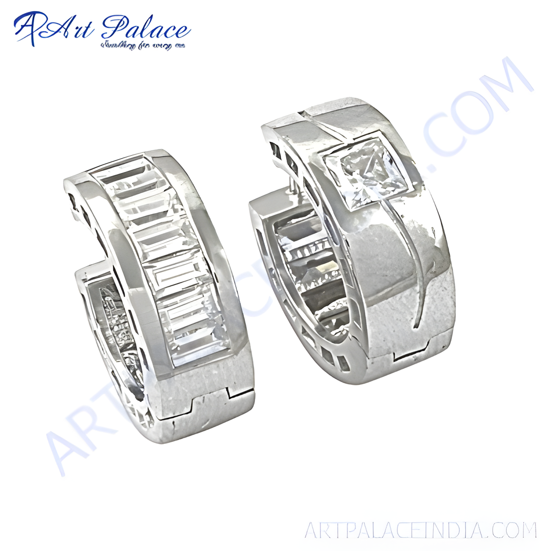 Silver hoop earrings with baguette cut and square diamonds. Elegant silver diamond jewelry.