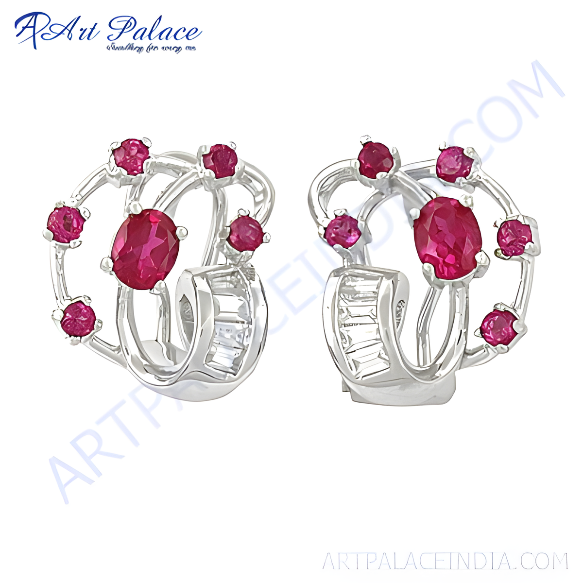 Silver dangle earrings with red ruby gemstones and sparkling diamonds, a perfect piece of luxury jewelry