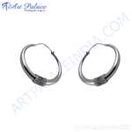 Load image into Gallery viewer, Sterling silver hoop earrings with an oxidized tribal design, perfect for women
