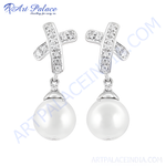 Load image into Gallery viewer, Silver dangle earrings with pearl drops, ideal for women, featuring a secure design and radiant luster.
