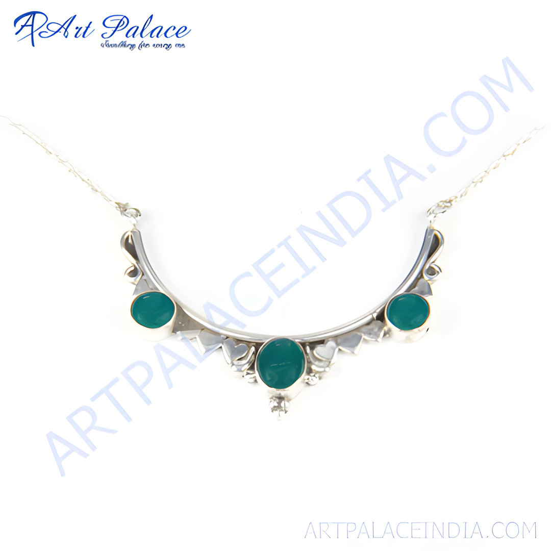 Sterling silver necklace with green gemstones. Elegant pendant design, perfect for gifting.