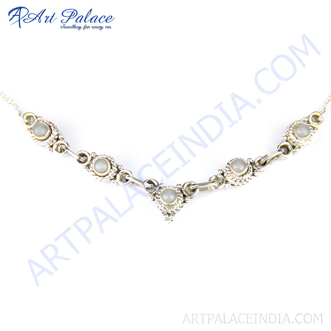 925 sterling silver moonstone necklace with delicate gemstone detail on white background.