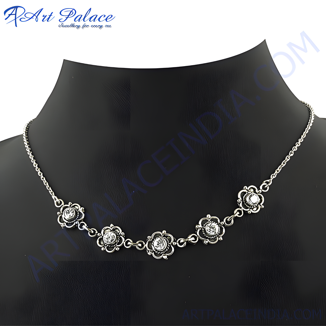 Sterling silver necklace with flower shaped pendants and sparkling gemstones, elegant women's jewelry.