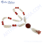 Load image into Gallery viewer, Silver beaded necklace with red agate beads and a large pendant, featuring silver chain detailing.
