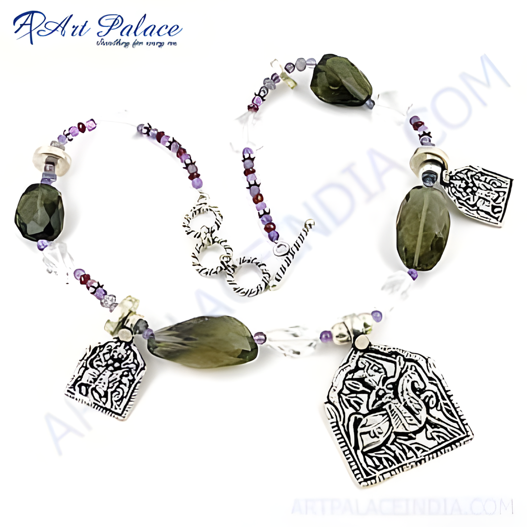 Sterling silver beaded necklace featuring green gemstone pendants and intricate silver detailing, perfect for women's jewelry.
