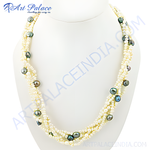 Load image into Gallery viewer, Multi-strand pearl necklace with dark colored gemstones on a white mannequin. Elegant and stylish pearl jewelry.
