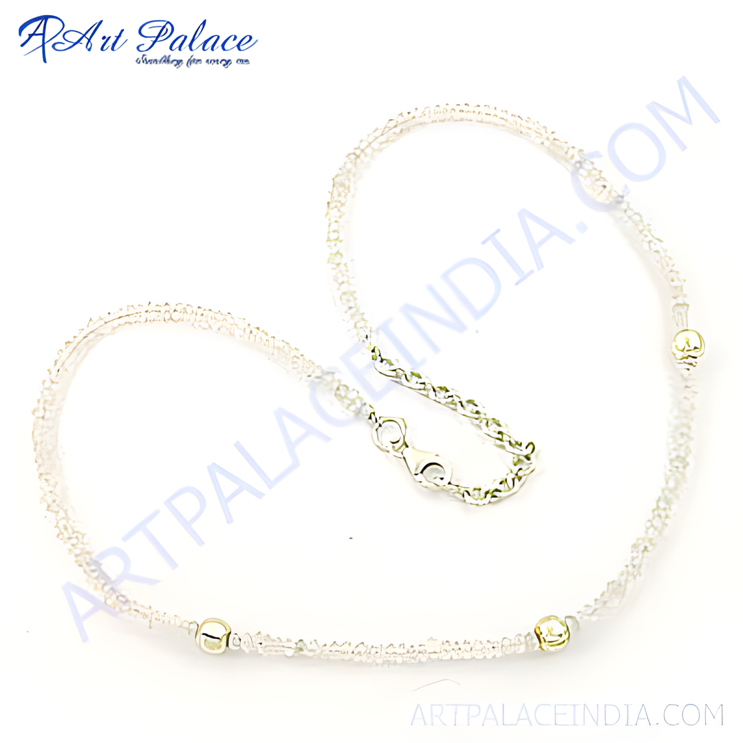 Clear crystal bead necklace with 925 silver chain and metallic accents against a white background.