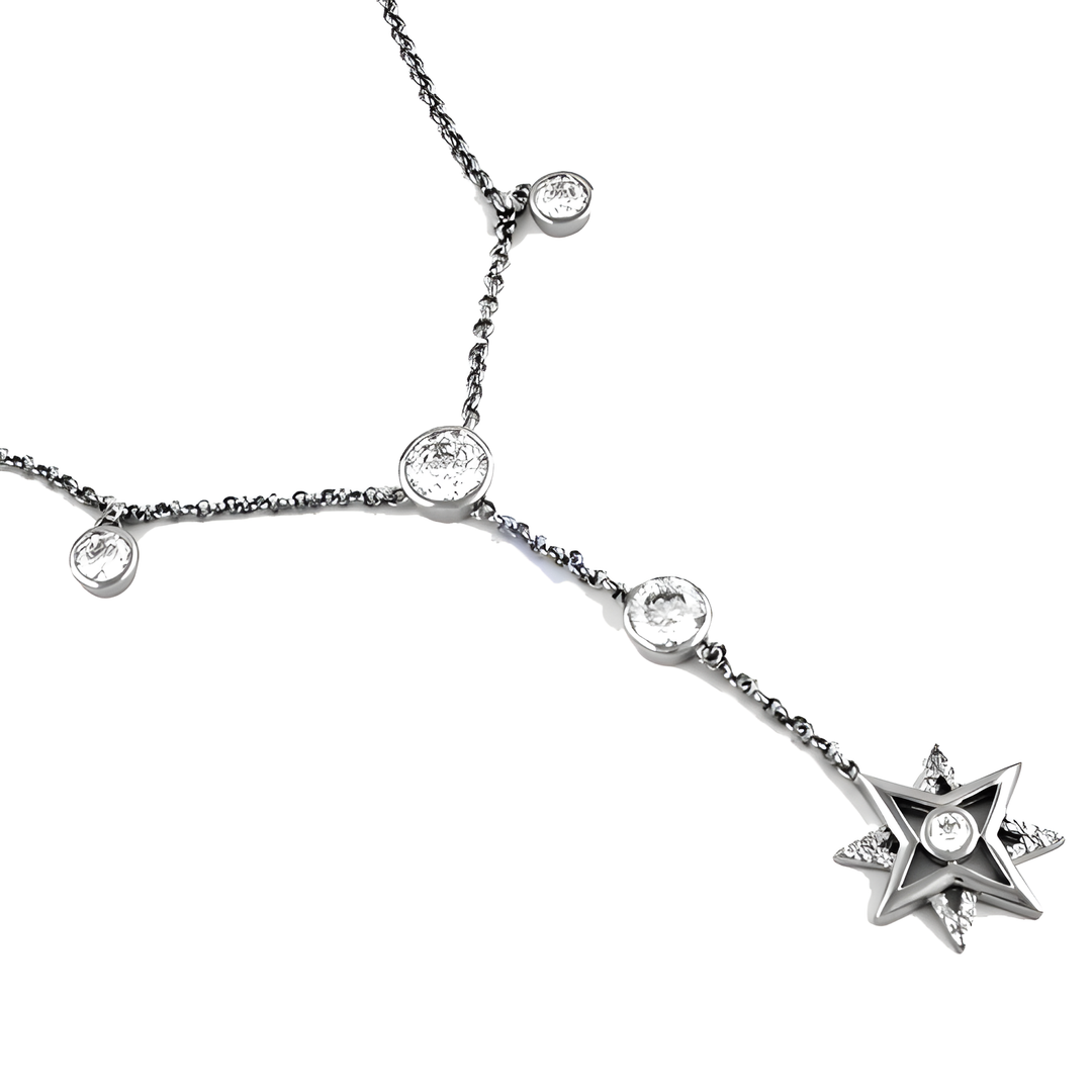 Sterling silver starburst pendant necklace with sparkling cubic zirconia diamonds on a white background.