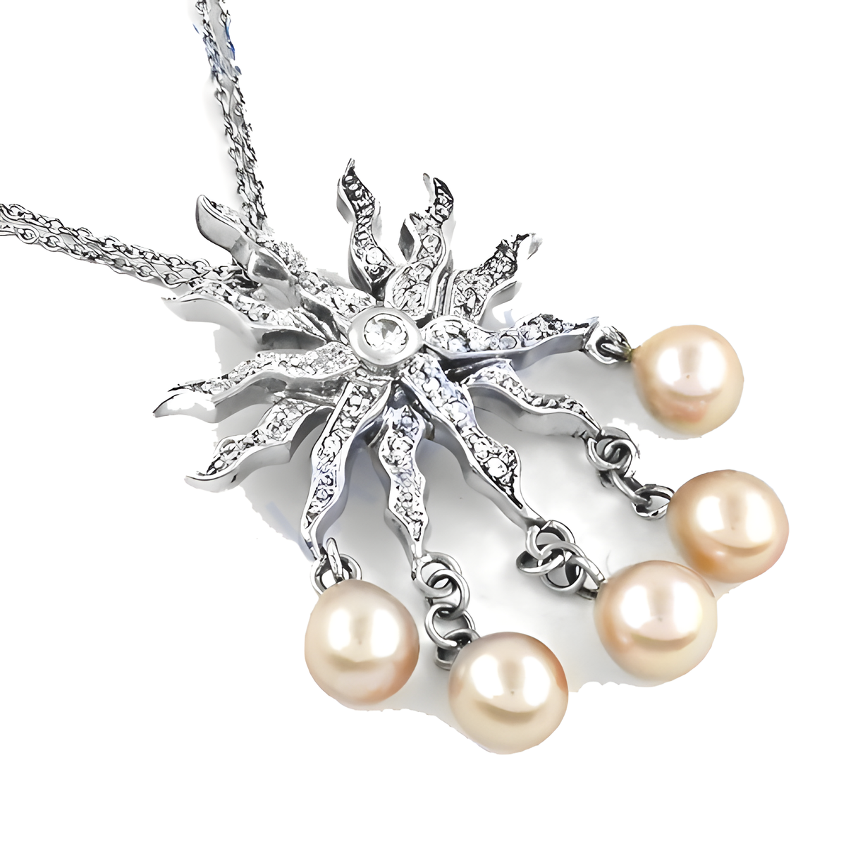 Silver sunburst pendant necklace with pearl drops, a beautiful and elegant piece
