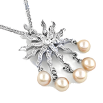Load image into Gallery viewer, Silver sunburst pendant necklace with pearl drops, a beautiful and elegant piece.
