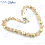 Load image into Gallery viewer, Rose quartz and pearl beaded necklace with gold accents, women&#39;s fashion jewelry.
