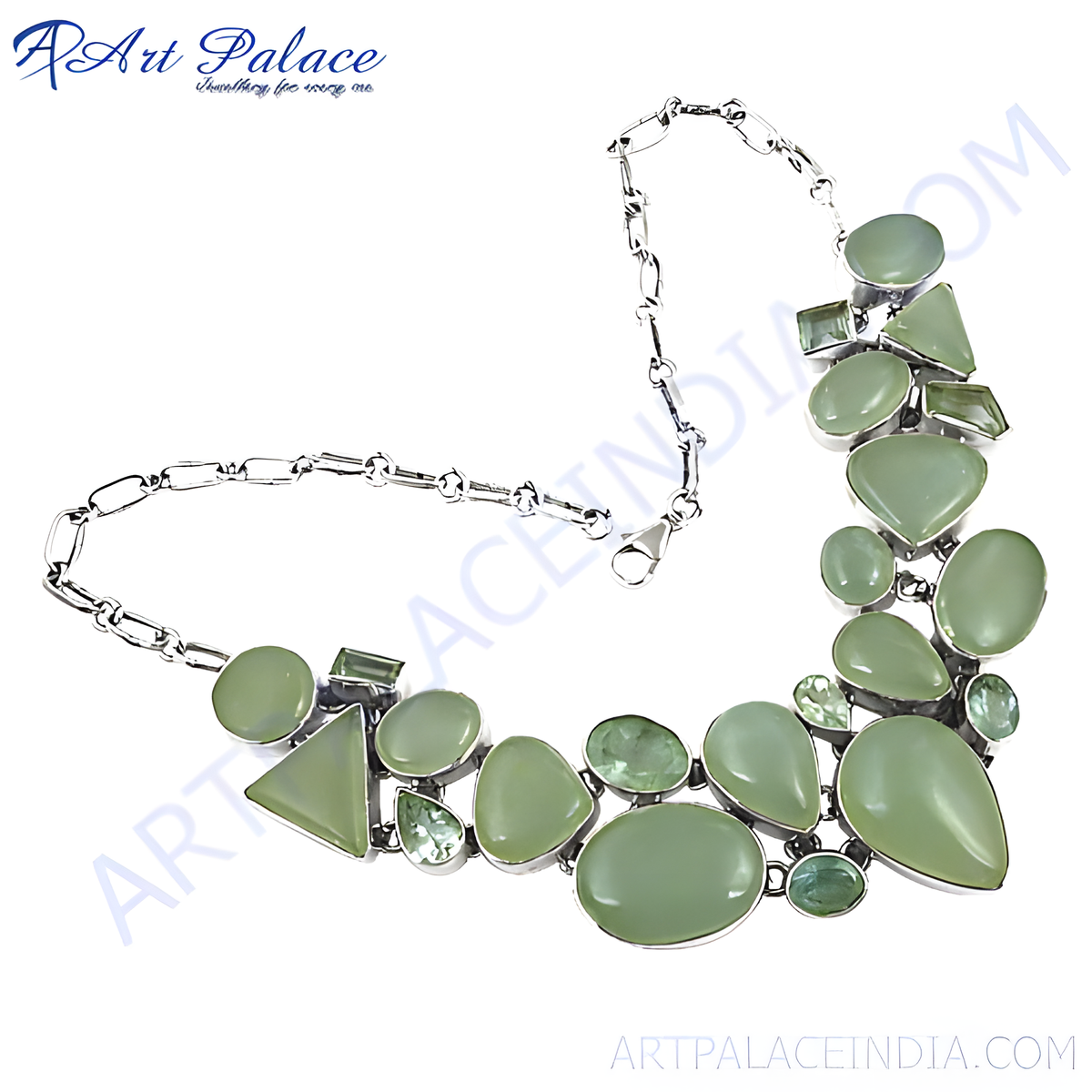 Silver statement necklace featuring various shapes of green gemstones, elegant jewelry piece for women