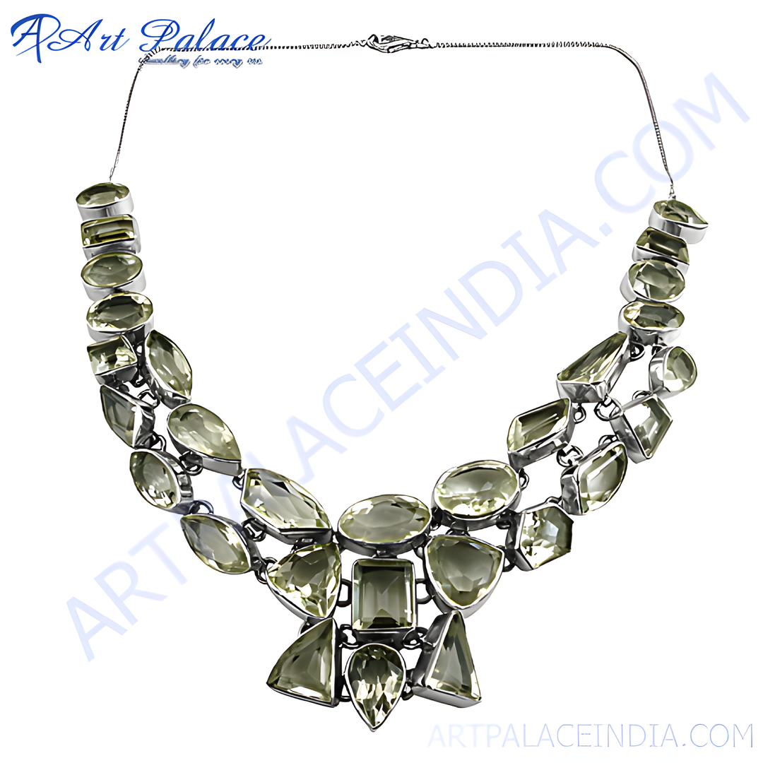 Silver statement necklace featuring multiple green-yellow lemon quartz gemstones.