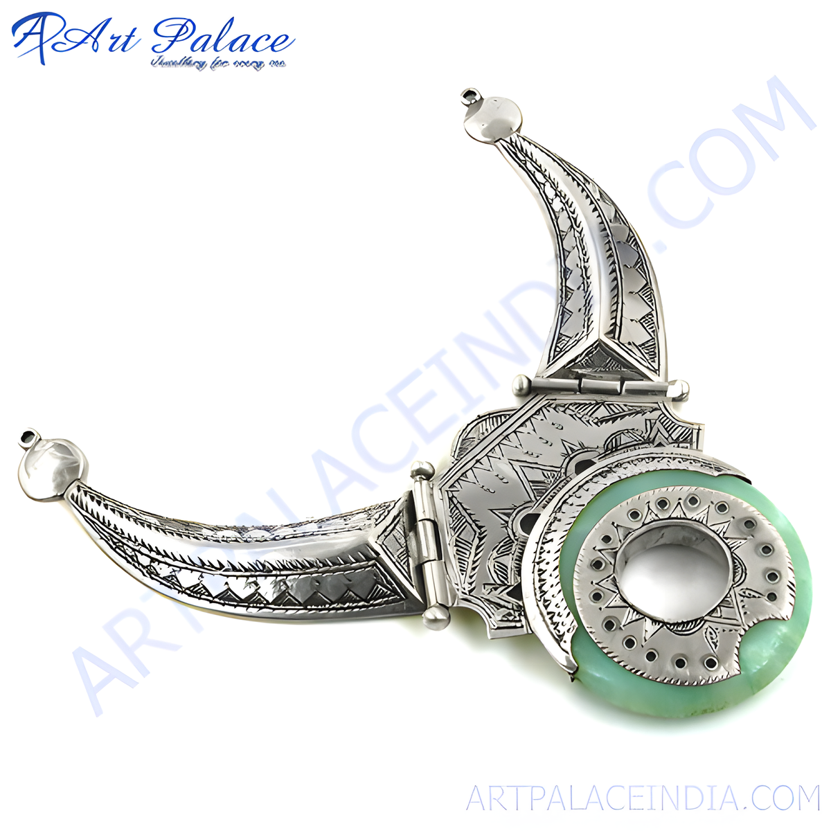 Silver pendant necklace with green stone, featuring a unique tribal design and intricate details