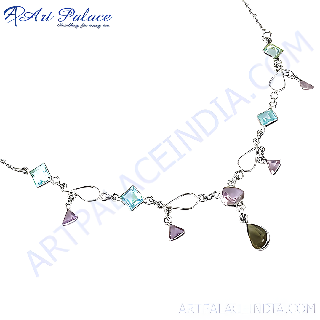 Sterling silver necklace with various colorful gemstones. Features blue, pink, and green stones.