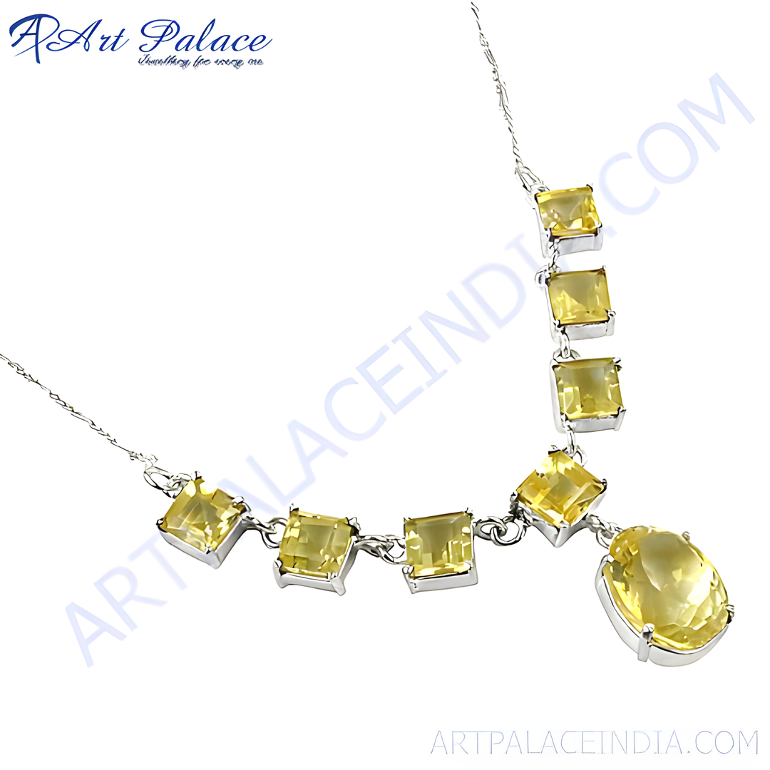 Sterling silver citrine necklace featuring yellow gemstones on a white background.