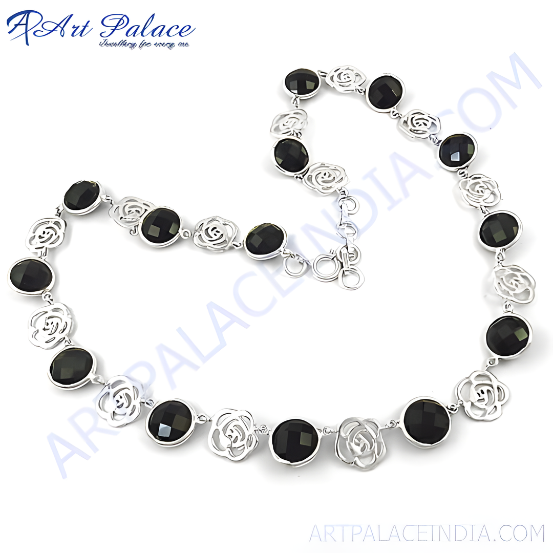 Sterling silver necklace featuring black onyx gemstones set in a rose design.