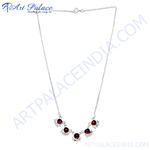 Load image into Gallery viewer, Sterling silver necklace with red garnet gemstones, elegant floral design.
