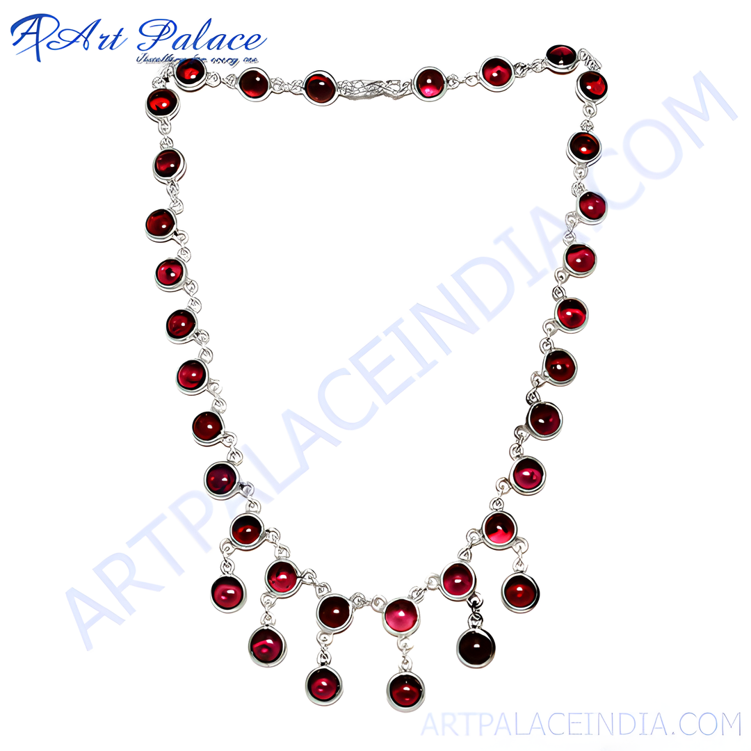 Sterling silver necklace with round red garnet gemstones, a beautiful and elegant piece of jewelry