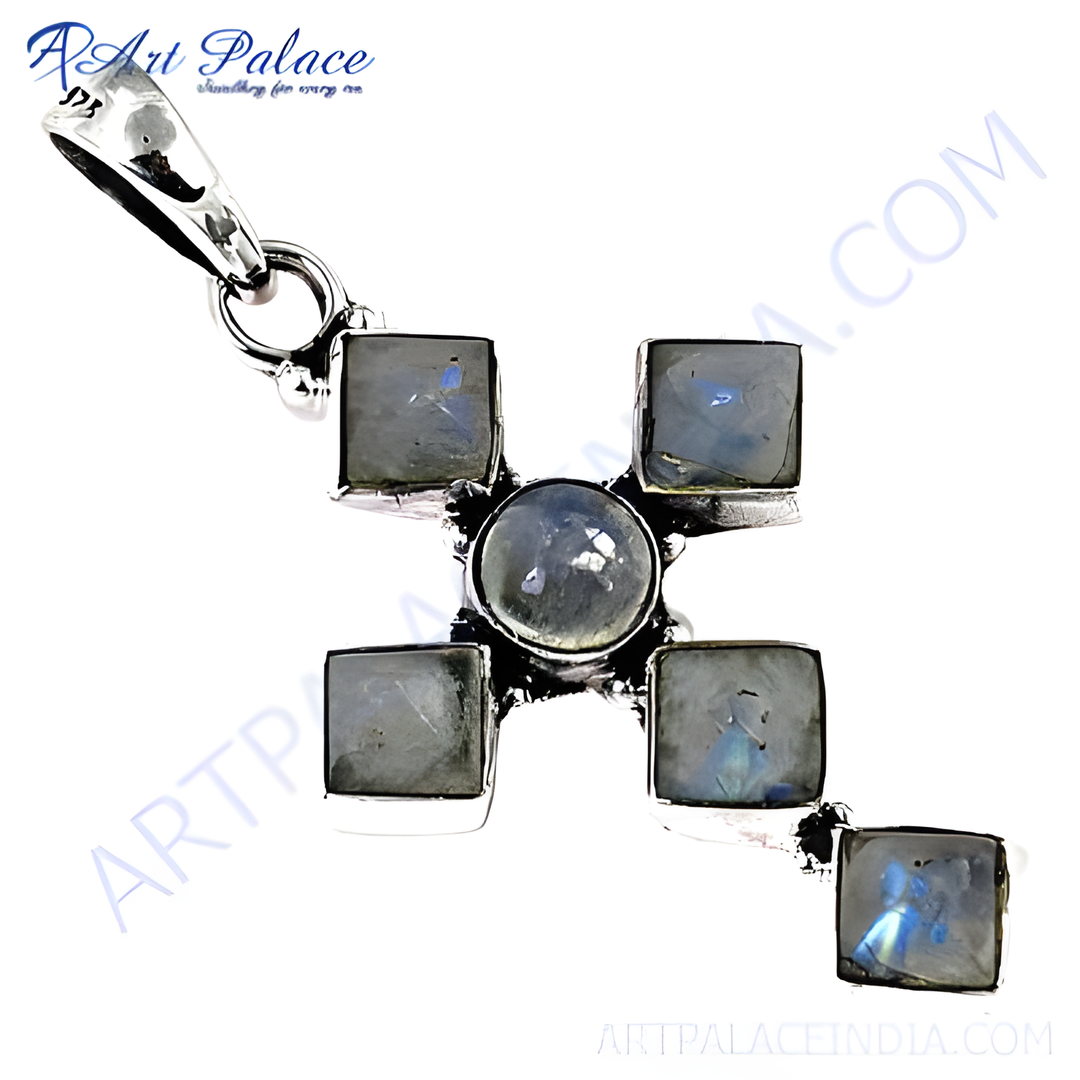 Sterling silver cross pendant with central round moonstone and square moonstone accents, shimmering blue and gray tones.