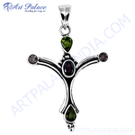 Load image into Gallery viewer, Sterling silver cross pendant with green peridot and purple amethyst gemstones. A beautiful piece of women's jewelry.
