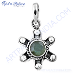Load image into Gallery viewer, Sterling silver flower pendant with a central green labradorite gemstone and accents.
