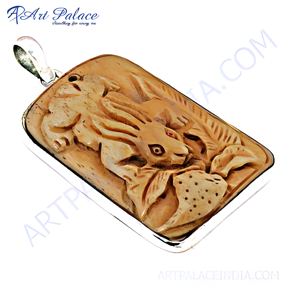 Rectangular pendant with carved bone rabbit design set in a silver border, detailed and artistic.