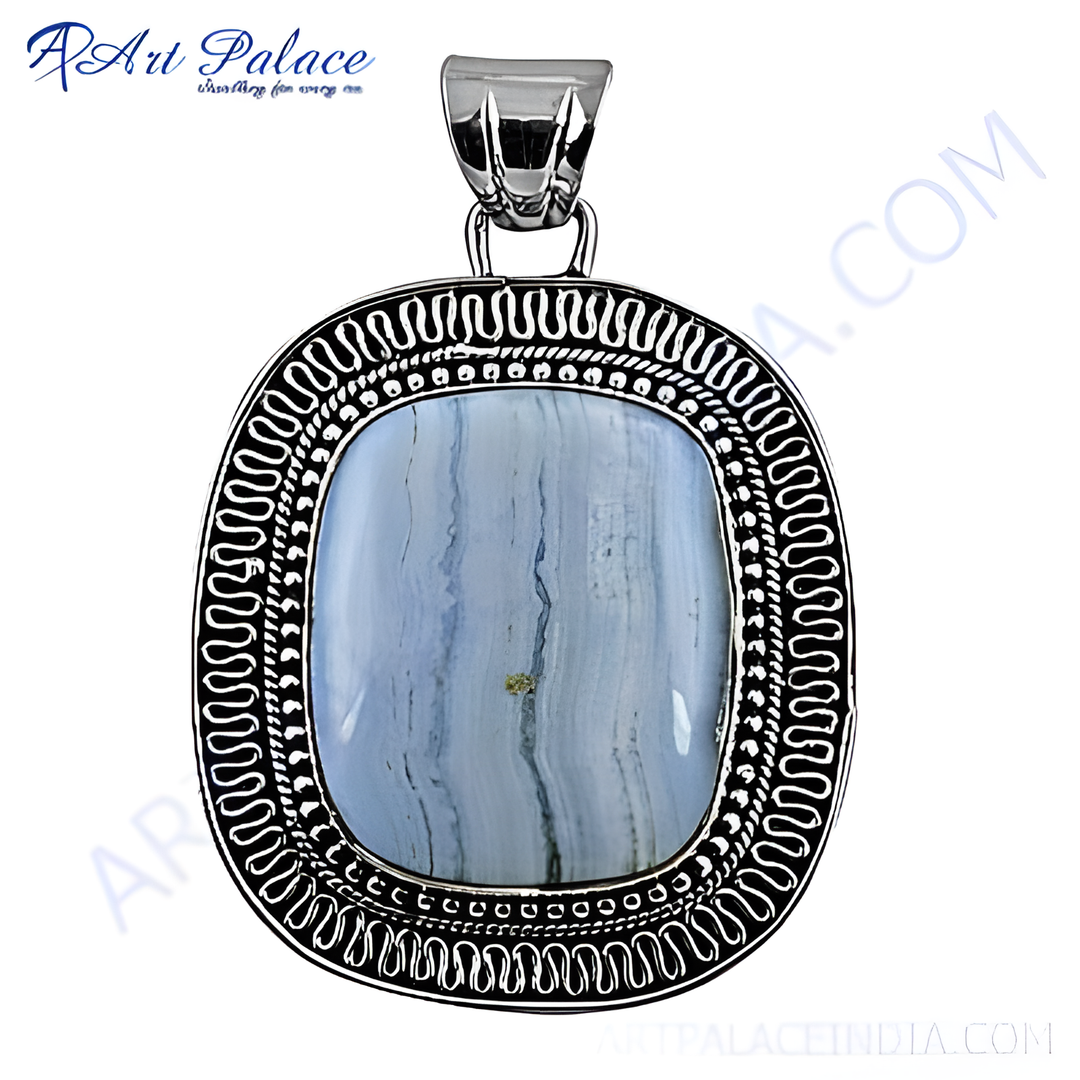 925 sterling silver oval pendant with a blue lace agate gemstone. Detailed silverwork around the stone
