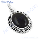 Load image into Gallery viewer, 925 sterling silver pendant with a black oval onyx gemstone center, ornate design.
