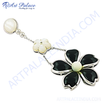 Load image into Gallery viewer, Sterling silver floral pendant necklace with black enamel petals and a white pearl center, elegant jewelry for women.
